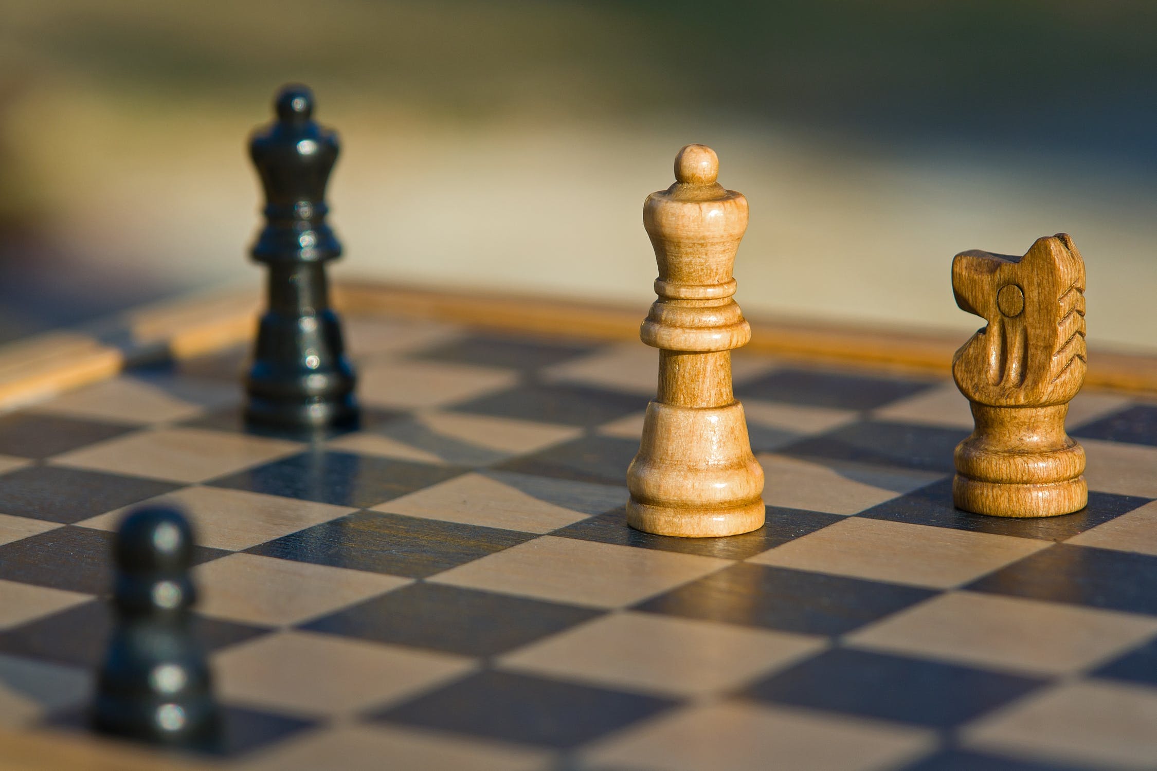 Pixabay - https://www.pexels.com/photo/brown-and-black-wooden-chess-piece-163427/