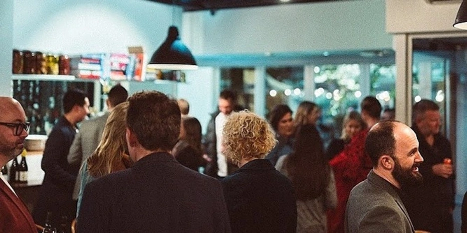 People networking at a bar