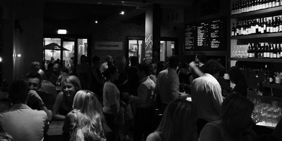Busy wine bar in black and white