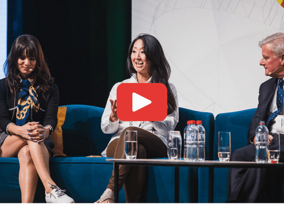 Two women and man speaking on panel