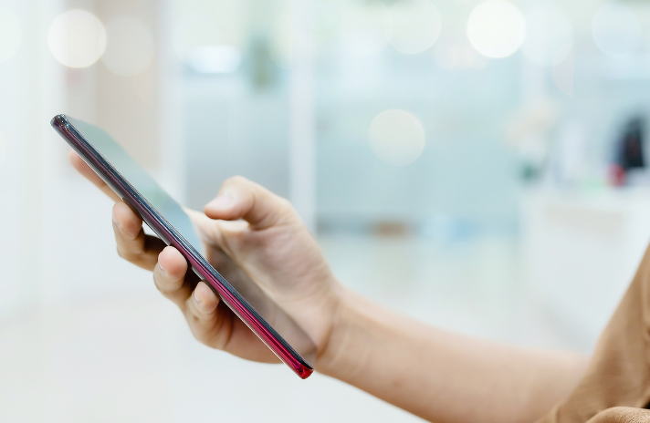 Hand holding smartphone