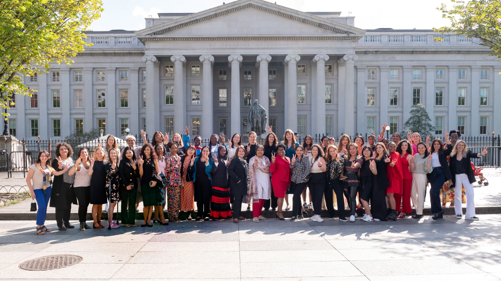 large group of women in front of capital buiding