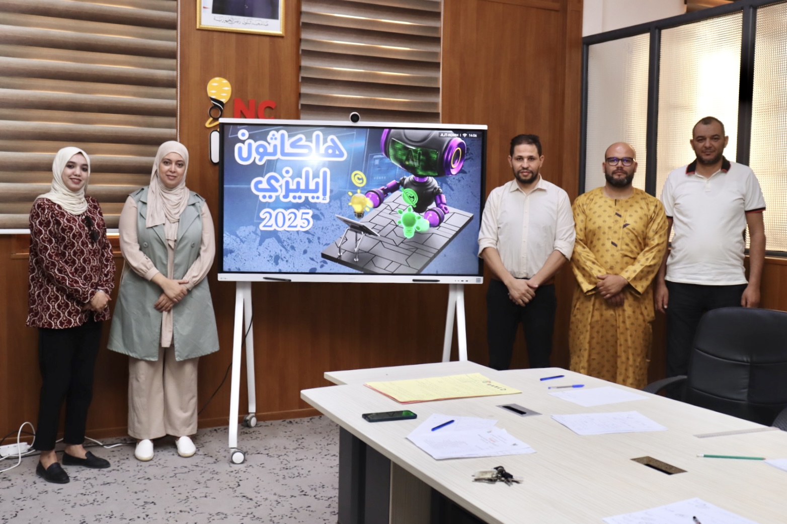 Image of the Hackathon Scientific Committee members reviewing and evaluating the participating teams’ presentations.