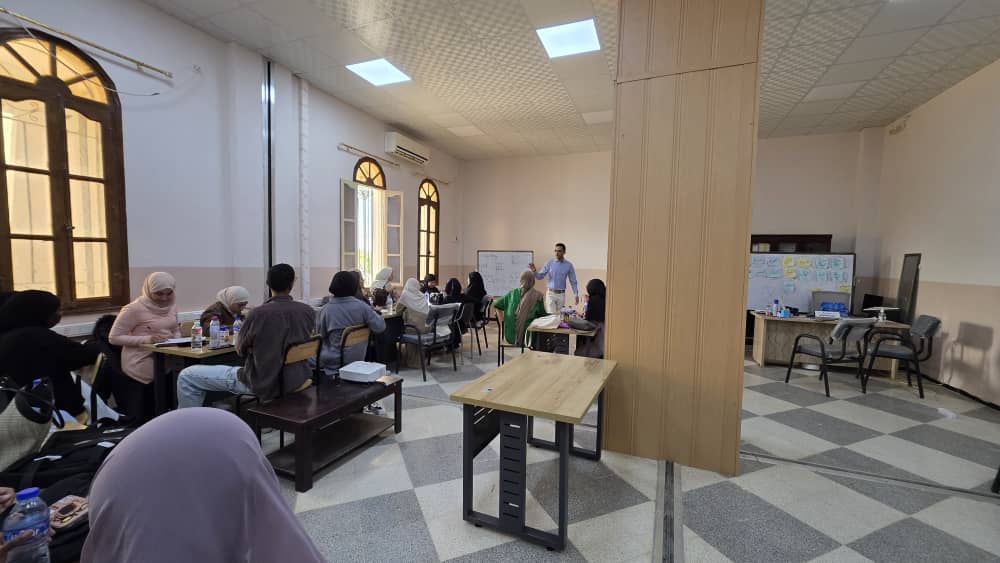 Participants—including students and faculty members—actively attending the workshop and engaging with the presented content.