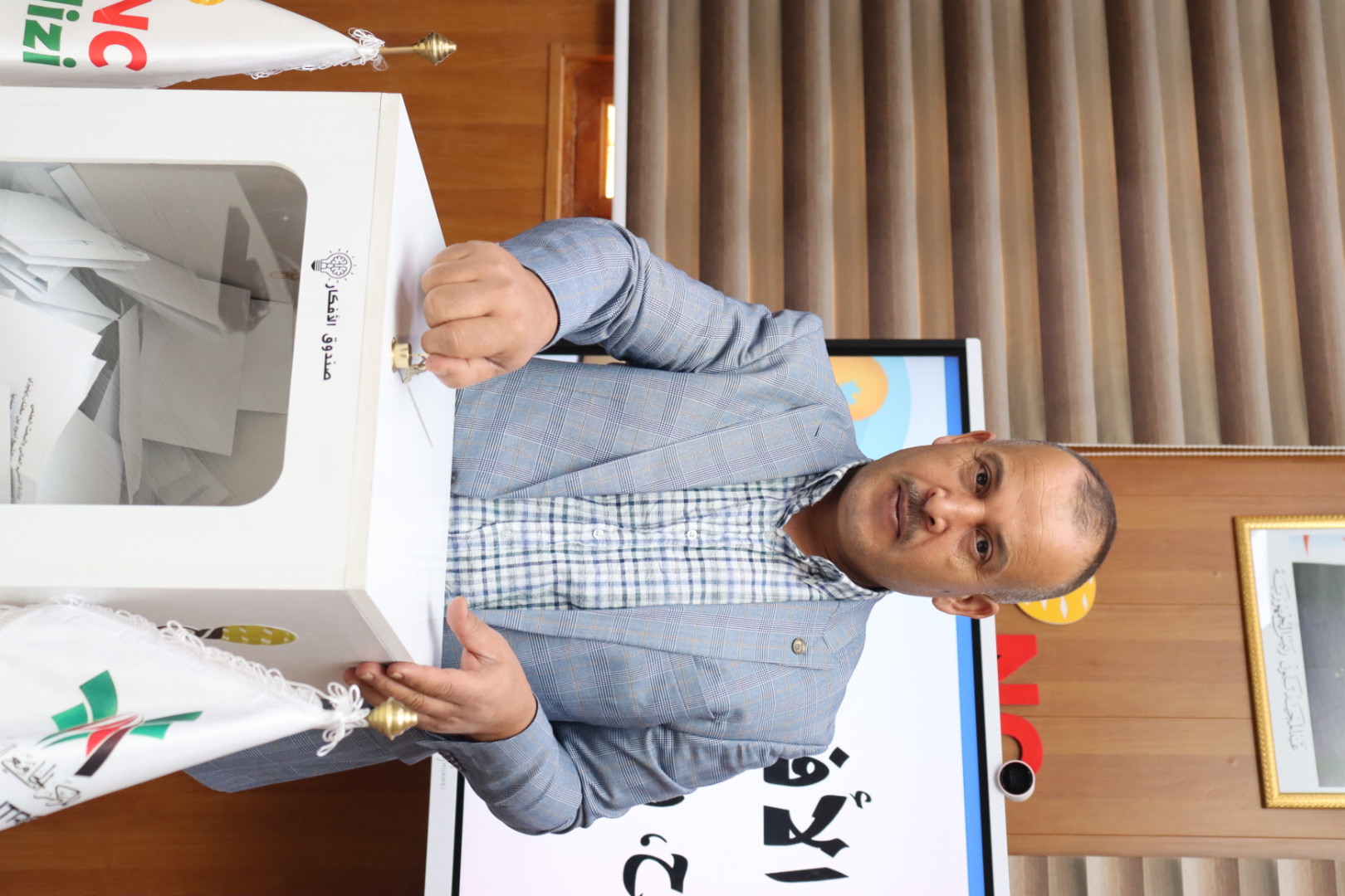 Image showing Prof. Moussa Boubeker, Director of the University Center of Illizi, attending the Idea Box evaluation session and overseeing the assessment process.