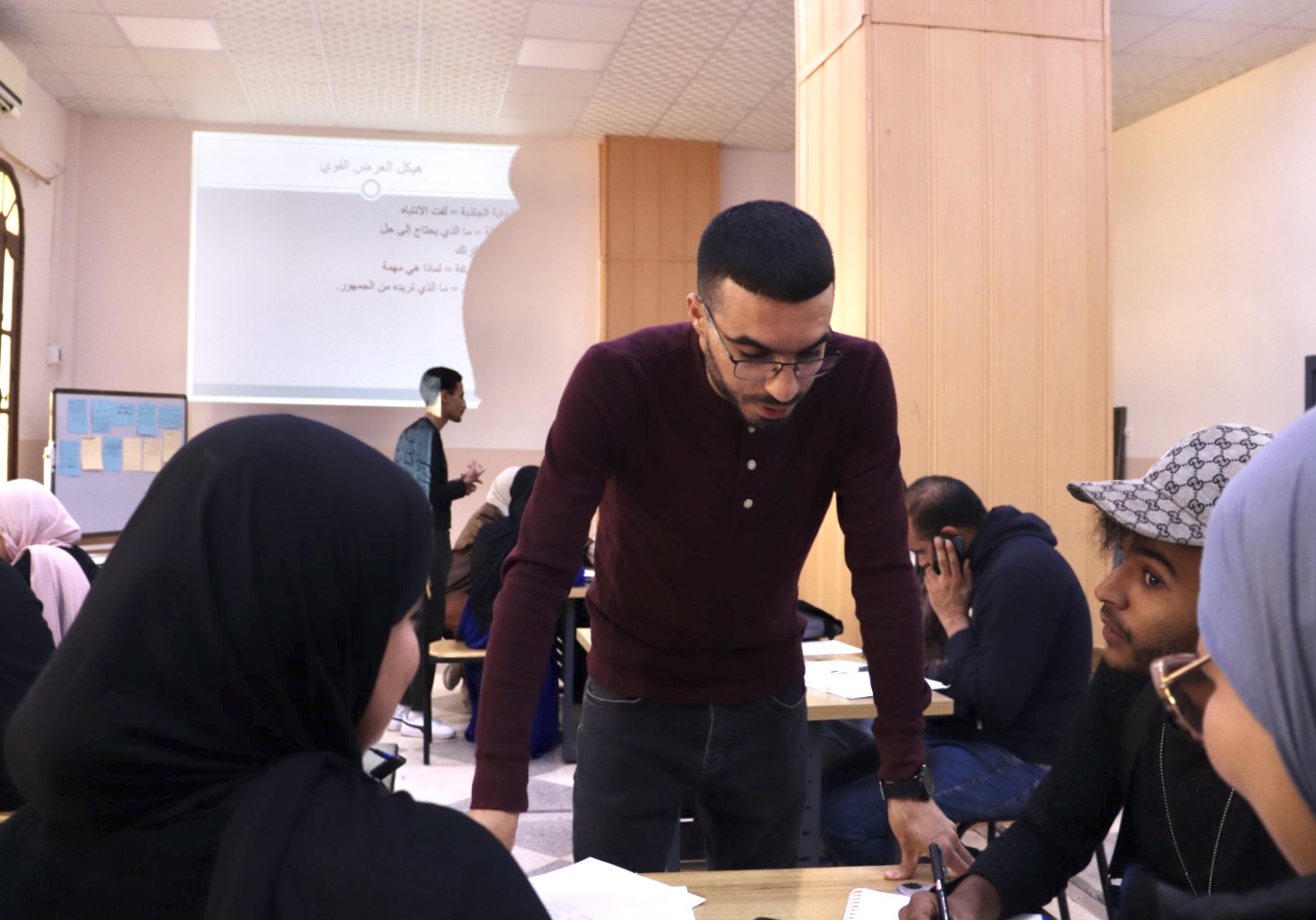 Image showing the workshop trainer delivering the session, speaking to participants and presenting key concepts related to pitching skills.