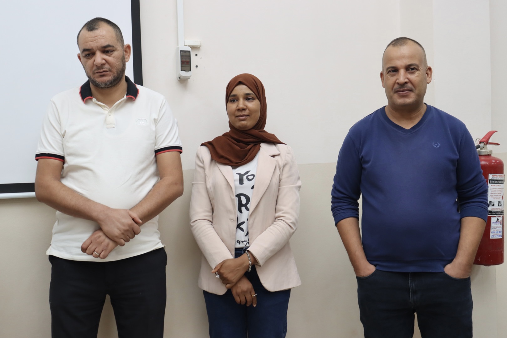 Image of the Director of the University Center of Illizi, Prof. Moussa Boubker, encouraging students as he visits the teams participating in the Illizi Hackathon 2025 during Global Entrepreneurship Week, motivating them to collaborate and innovate.