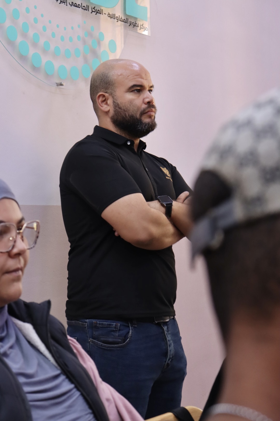 Image showing the Director of the Business Incubator attending the workshop, following the session and engaging with the presentation.