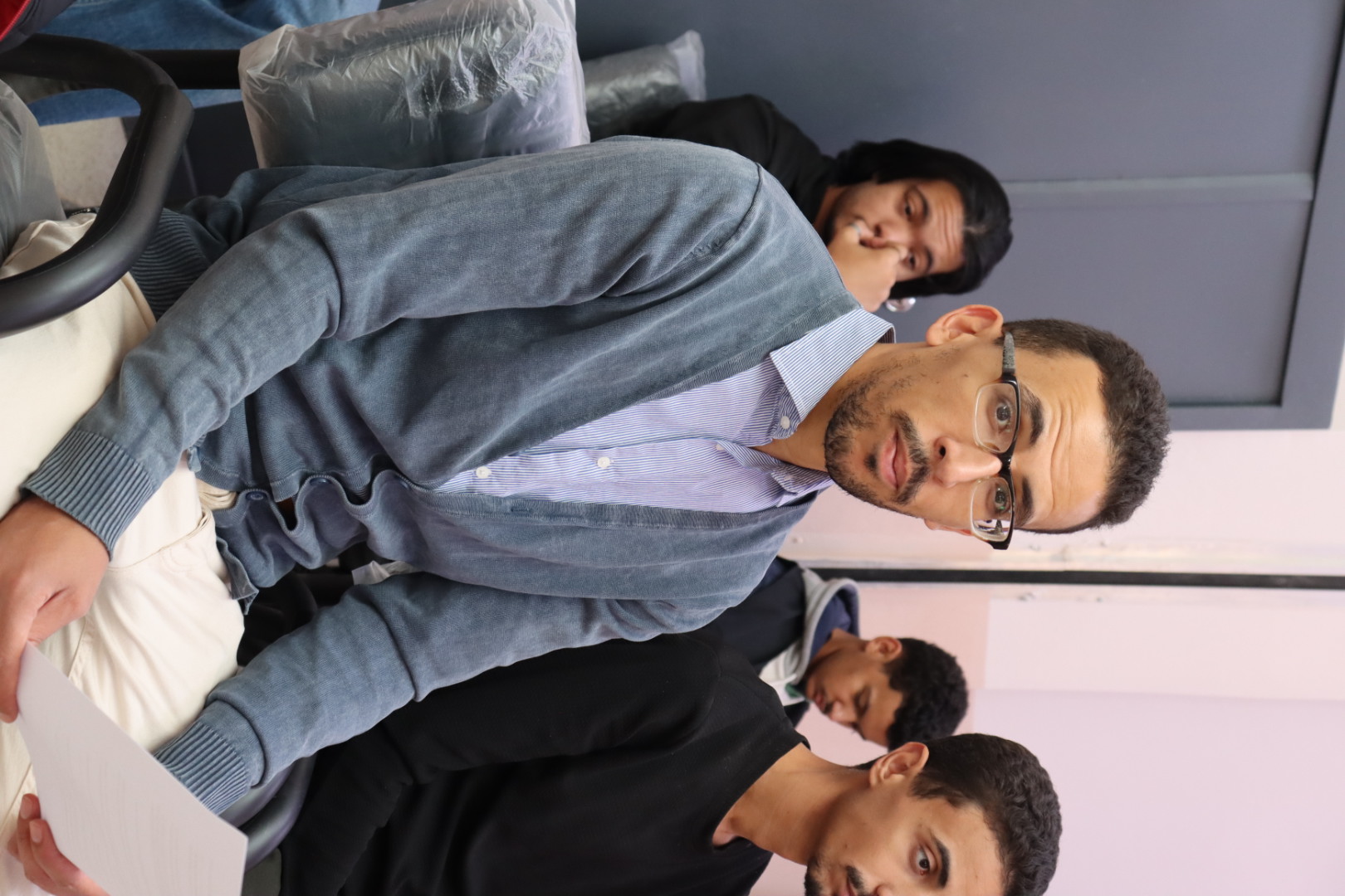 The workshop trainer presenting key concepts of cyber-awareness and engaging participants with practical explanations.