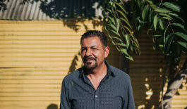 Mazin, founder of Lami Auto, looks sternly into the distance